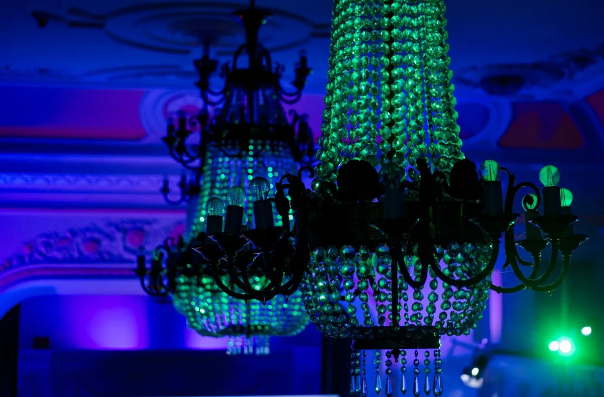 A chandelier and coloured lights inside Banski dvor